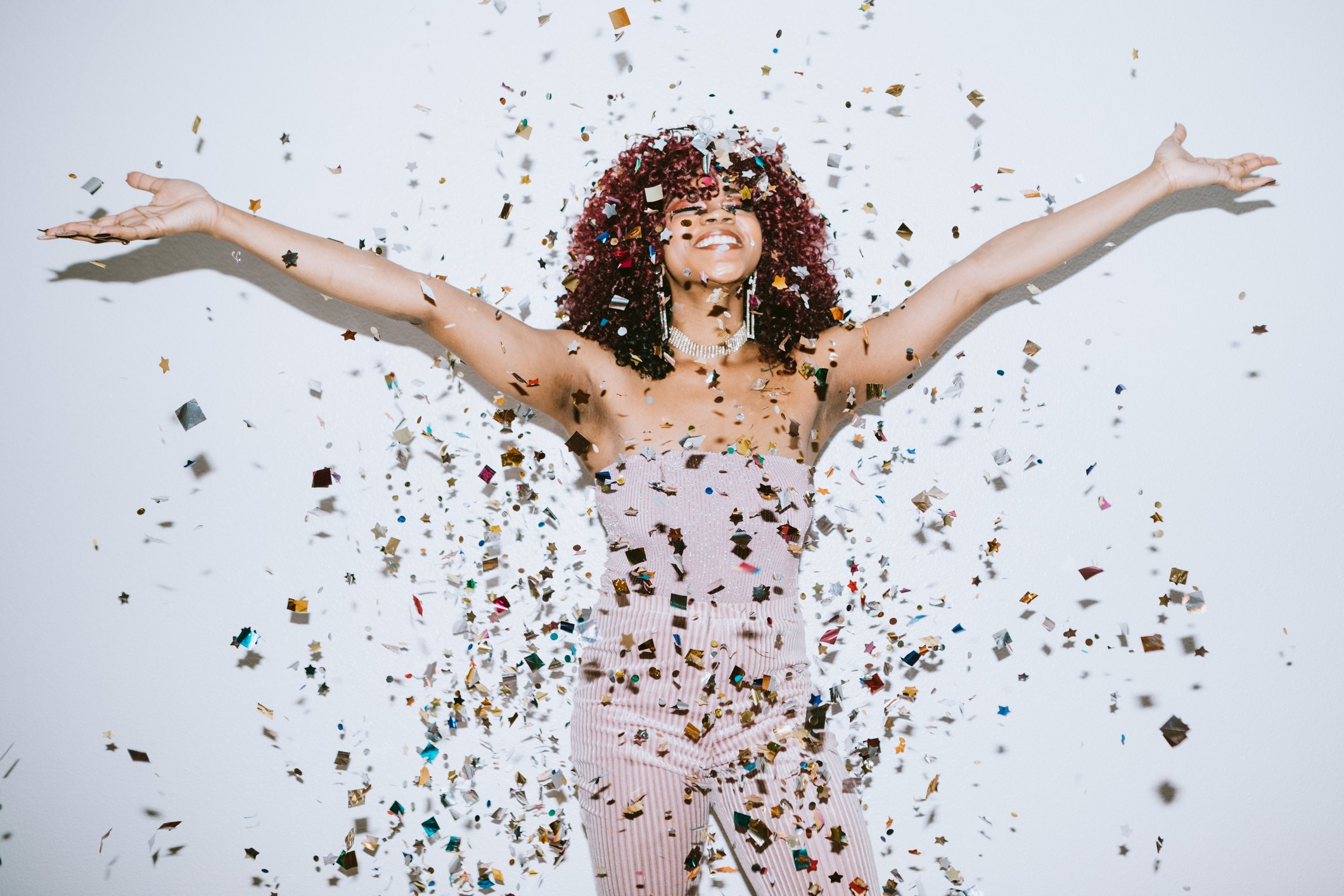 Generation Z Young Woman Celebrates With Confetti Generation Z Young Woman Celebrates With Confetti
